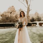Lace ivory wedding dress by Anna Skoblikova